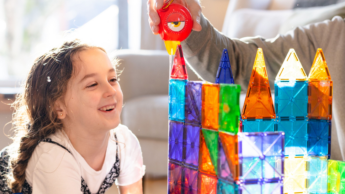 Child learning Stem with Handy Famm and Magnatiles